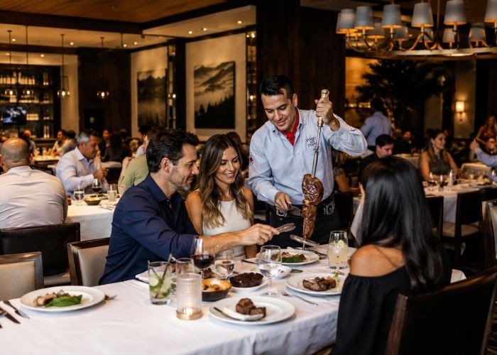 Guests dining in smart casual attire at Fogo de Chão Brazilian Steakhouse