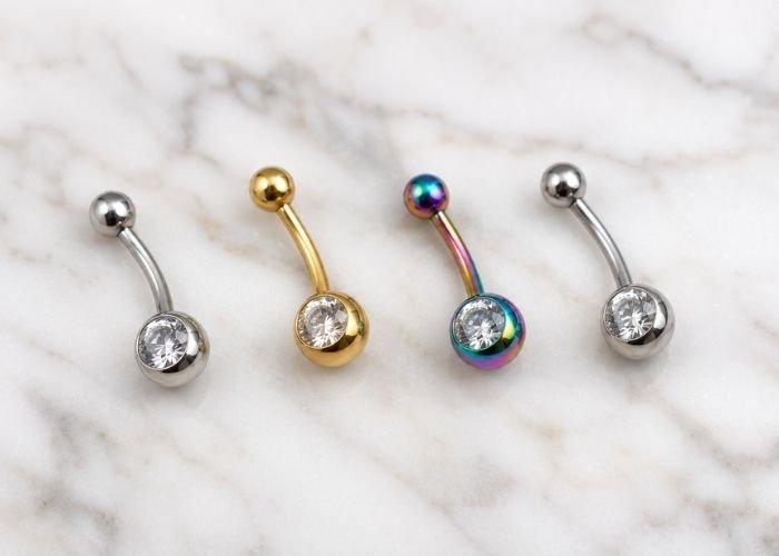 Choosing the right jewelry materials for double belly button piercings